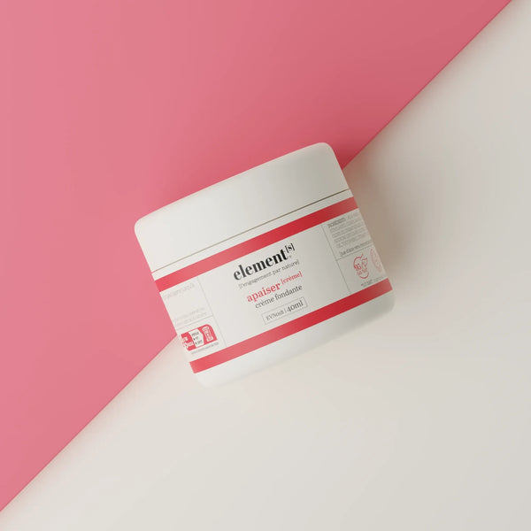 Crème fondante Éléments pour le visage 40 ml – présentée sur un fond coloré rouge et lin.